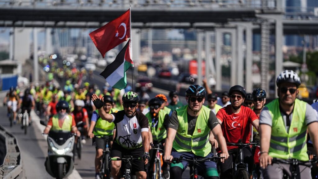 Cyclists ride across the July 15 Martyrs Bridge marking the ninth anniversary of the 2016 coup attempt, Istanbul, Türkiye, July 13, 2025. (AA Photo)