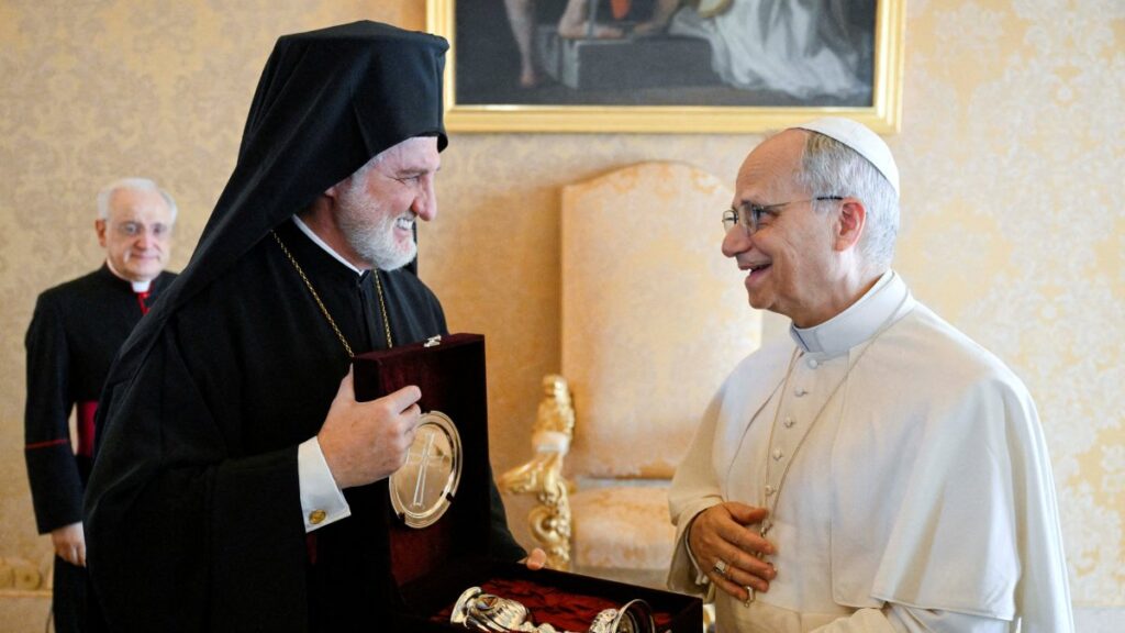 Pope Leo interacts with Greek Orthodox Archbishop Elpidophoros of America, as he attends a meeting with participants of the Orthodox-Catholic Ecumenical Pilgrimage from the U.S., Vatican City, July 17, 2025. (Reuters Photo)