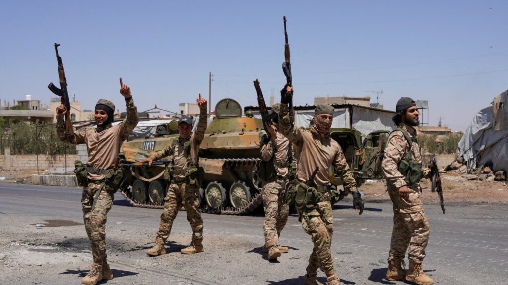 Syrian security forces walk together along a street, after clashes between Syrian government troops and local Druze fighters, Suwayda, Syria, July 16, 2025. (Reuters Photo)