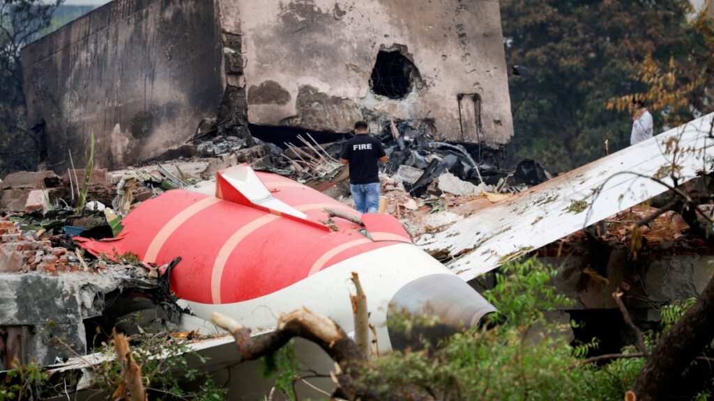 A firefighter stands next to the crashed Air India Boeing 787-8 Dreamliner aircraft, Ahmedabad, India, June 13, 2025. (Reuters Photo)
