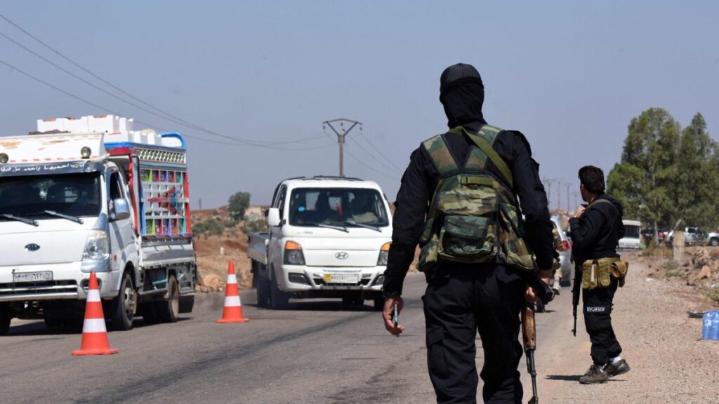 Syrian government security forces man a checkpoint, to prevent Bedouin tribal fighters from reaching the city of Suwayda, along a road in southern Suwayda province, Syria, July 19, 2025. (AFP Photo)