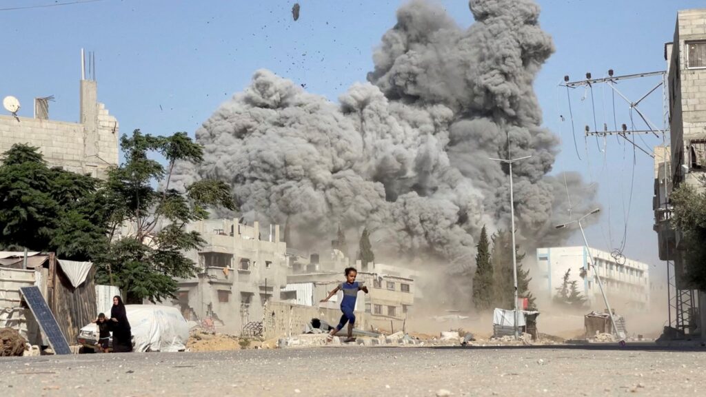 In this screen grab from video obtained by Reuters, a girl runs from the scene after Israeli strikes on a school sheltering displaced people at the Bureij refugee camp in the central Gaza Strip, July 17, 2025. (Reuters Photo)