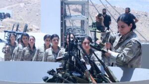 PKK terrorists line up to put their weapons into a pit during a disarmament ceremony, in the city of Sulaymaniyah, Iraq, July 11, 2025. (AFP Photo)