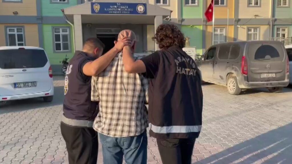 Police officers detain a suspect wanted for a 1984 murder in Germany during a coordinated operation, Hatay, Türkiye, July 24, 2025. (IHA Photo)
