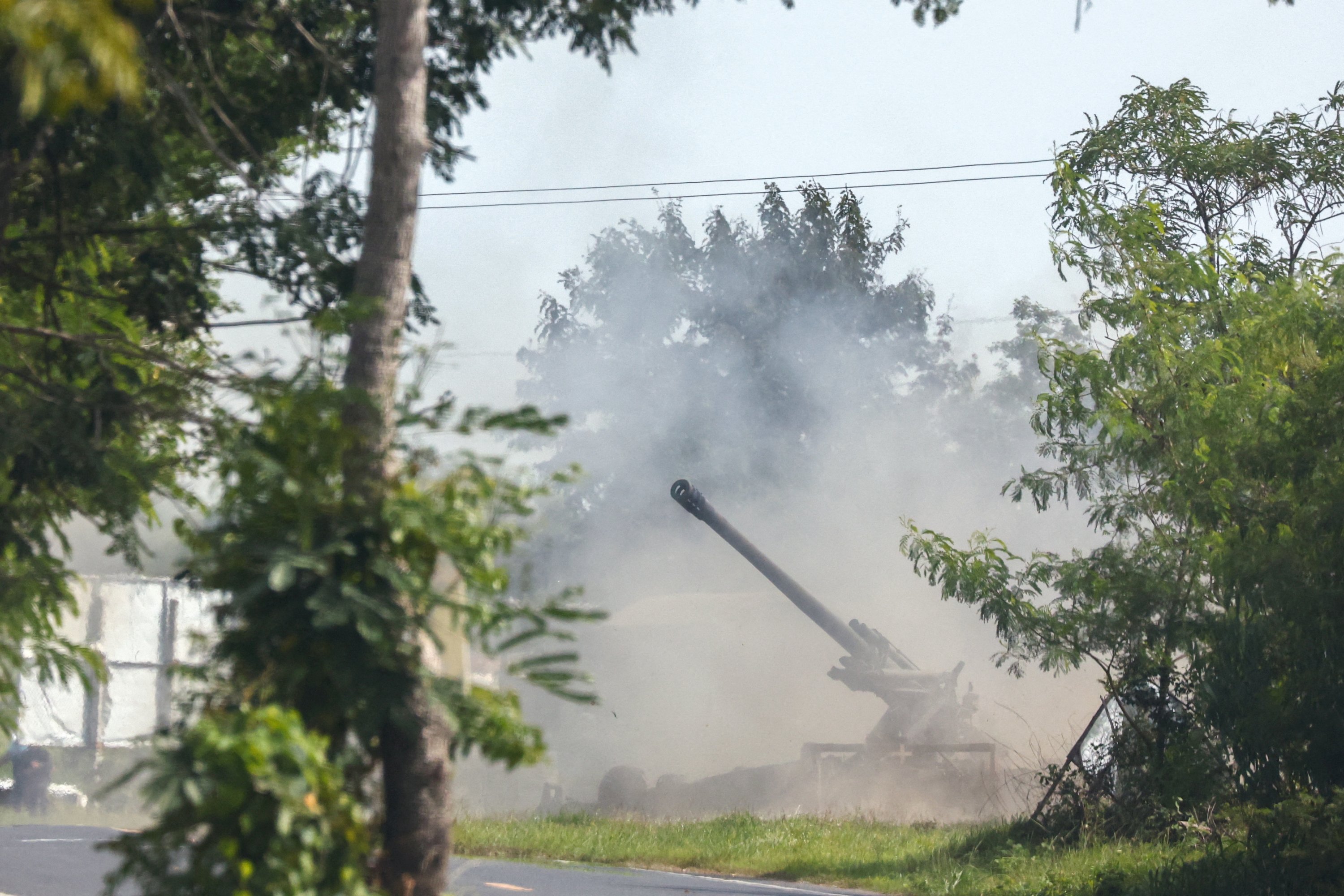393453 A Thai military mobile unit fires toward Cambodia's side after Thailand and Cambodia exchanged heavy artillery as their worst fighting in more than a decade stretched for a second day, Surin, Thailand, July 25, 2025. (Reuters Photo)