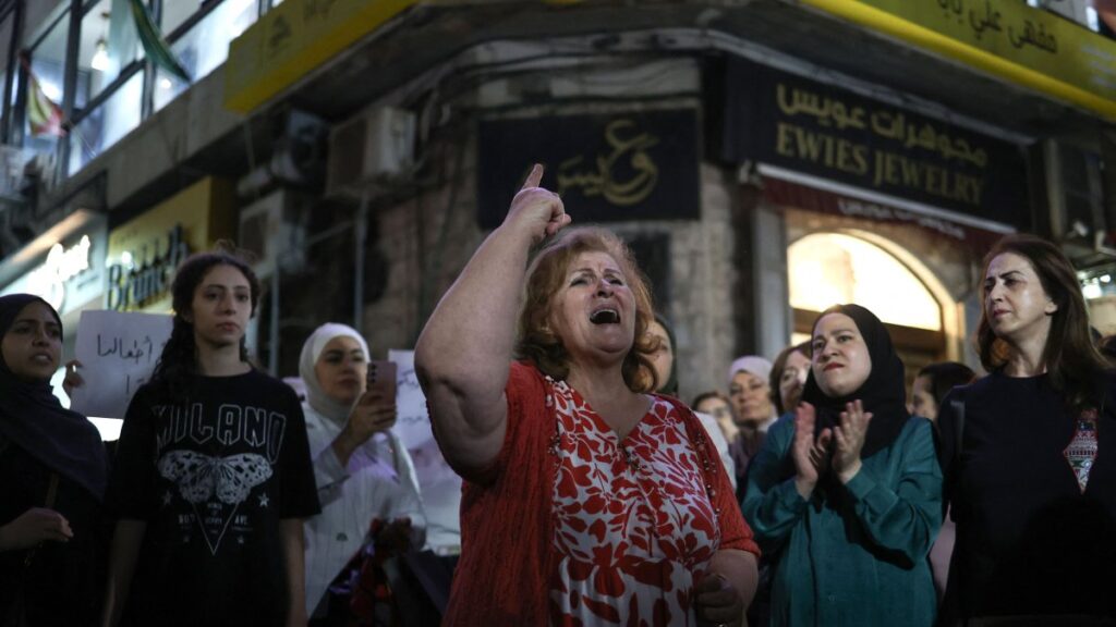 A Palestinian woman chants slogans during a demonstration in support of Palestinians in Gaza facing severe shortages of food and other essentials in the city of Ramallah, Israeli-occupied West Bank, Palestine, July 23, 2025. (AFP Photo)