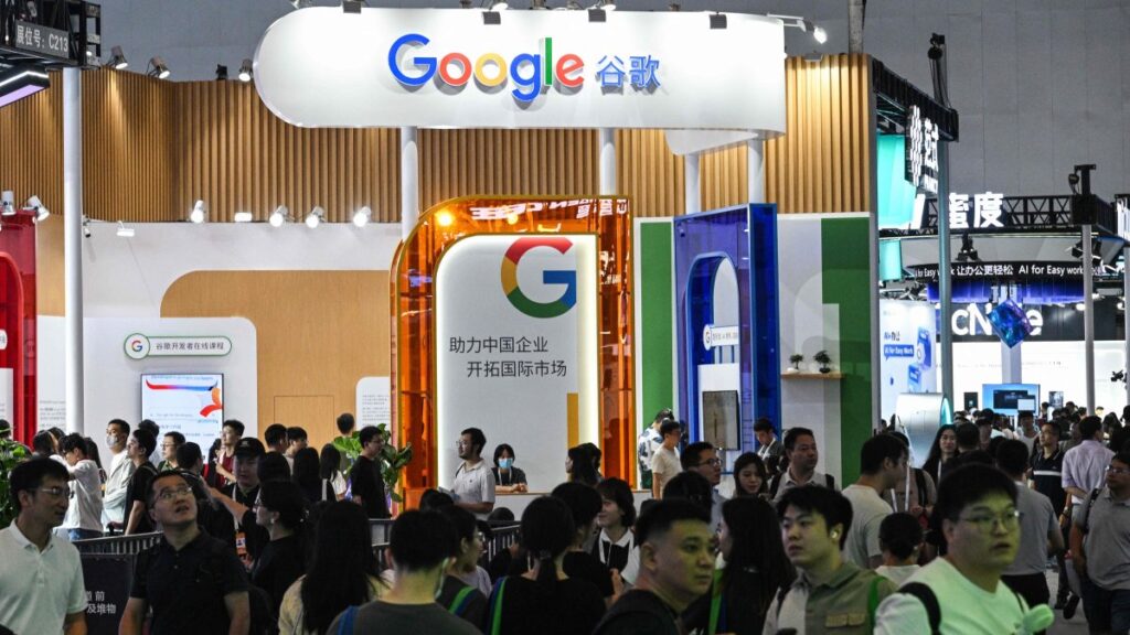 People walk past a Google stand during the World Artificial Intelligence Conference (WAIC) at the Shanghai World Expo and Convention Center, Shanghai, China, July 28, 2025. (AFP Photo)