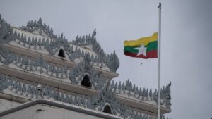 Myanmar's national flag flutters at half-mast outside the City Hall on the 78th Martyrs' Day that marks the anniversary of the assassination of independence leaders, including General Aung San, father of the currently deposed and imprisoned leader Aung San Suu Kyi, Yangon, Myanmar, July 19, 2025. (AFP Photo)