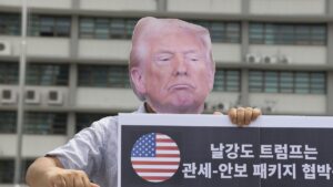 A protester wears a mask depicting U.S. President Trump during a rally against U.S. President Trump's policy on South Korea, near the U.S. Embassy, Seoul, South Korea, July 30, 2025. (EPA Photo)