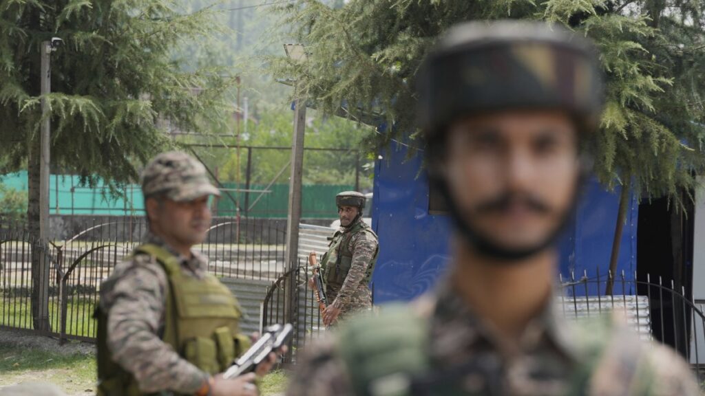 Indian soldiers guard a checkpoint near the site of a gun battle on the outskirts of Srinagar, India-occupied Kashmir, July 28, 2025. (AP Photo)