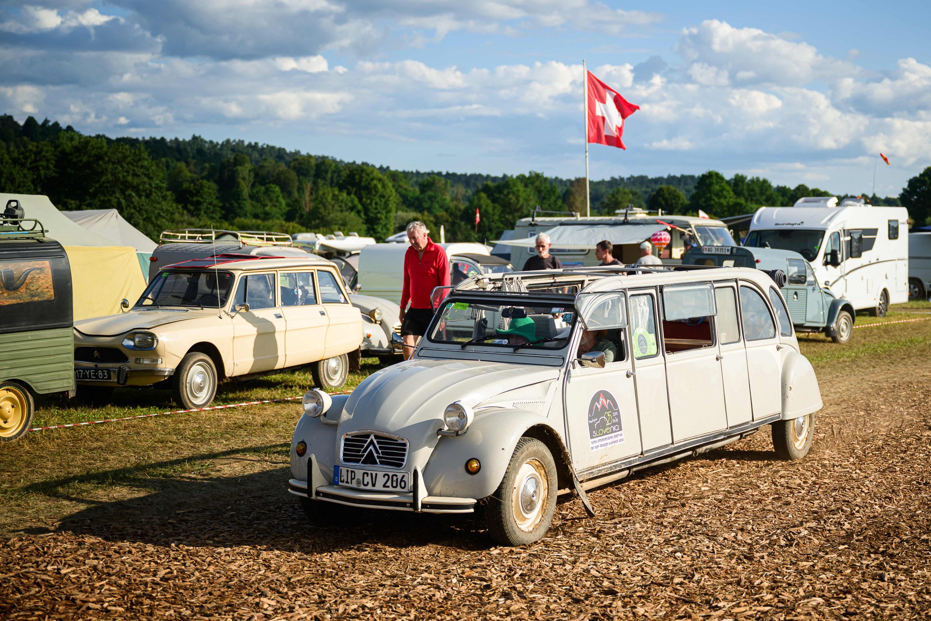 394890 A Citroen 2CV extended van drives through a camp during the 25th World Meeting of 2CV Friends in Postojna, Slovenia, July 30, 2025. (AFP Photo)