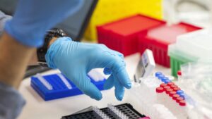 A lab technician prepares DNA samples for analysis at Complete Genomics in San Jose, Calif., Monday, July 22, 2024. (AP File Photo)