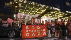 People in support of "If Not Now," a Jewish pro-Palestine organization, protest U.S. President Donald Trump's involvement in the Israeli-Palestinian conflict and the starvation happening in Gaza, in front of the Trump Hotel, New York, U.S., Aug. 4, 2025. (EPA Photo)