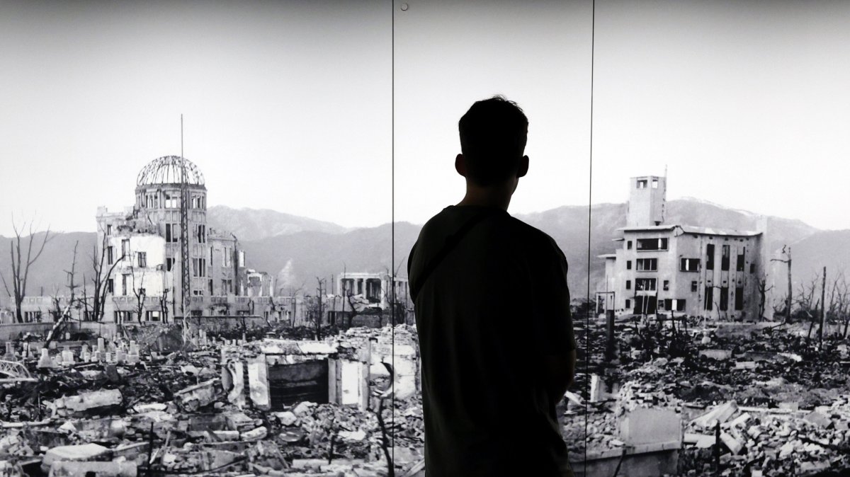 A visitor looks at a huge picture of Hiroshima devastated by the world's first atomic bombing at the Hiroshima Peace Memorial Museum, Hiroshima, western Japan, Aug. 5, 2025. (EPA Photo)