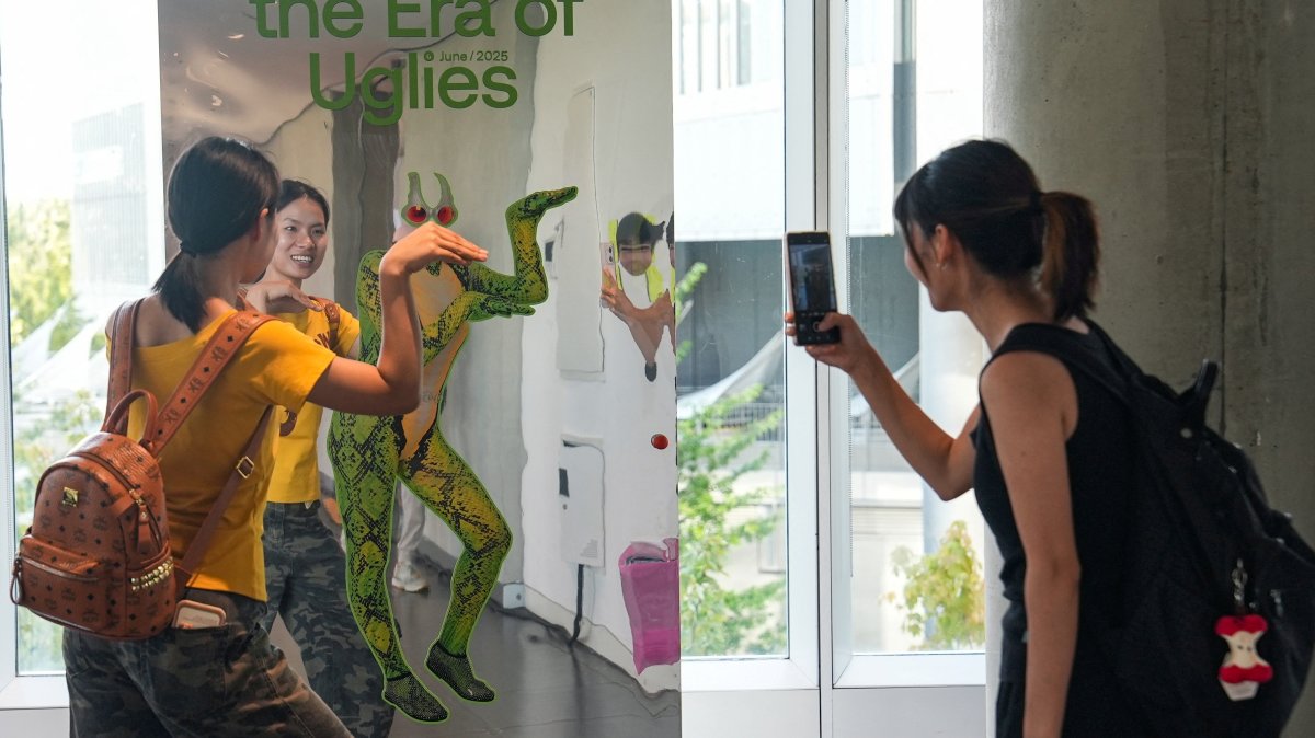 People visit the exhibition "Era of Uglies Has Arrived" by Alibaba's Taobao, in Hangzhou, Zhejiang province, China, Aug. 13, 2025. (Reuters Photo)